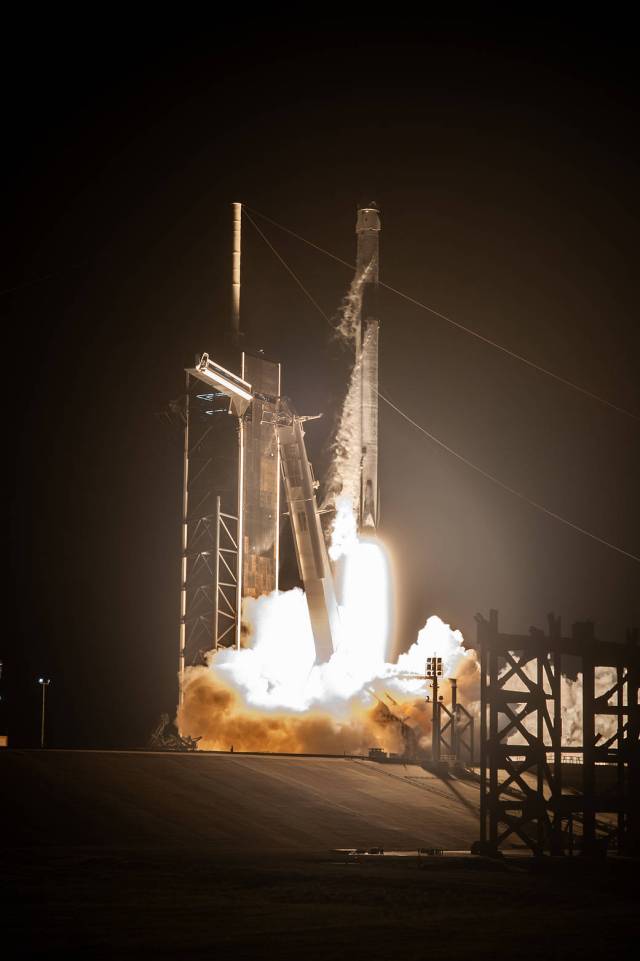 In the early morning hours, SpaceX's Falcon 9 rocket lifts off from Kennedy Space Center's Launch Complex 39A, carrying a crew of four on the Crew-2 mission.