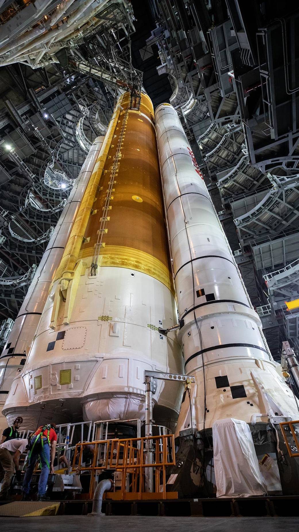 Small markings around the aft struts, which connect the twin solid rocket boosters to the core stage of SLS, are carefully watched during tanking.