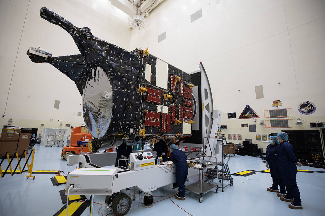 Technicians at NASA’s Kennedy Space Center in Florida perform work on the agency’s Psyche spacecraft inside the Payload Hazardous Servicing Fac...