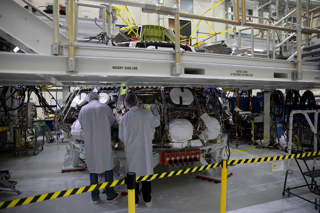 The Orion crew module for Artemis II is powered on for the first time in the Neil Armstrong Operations and Checkout Building at Kennedy Space Center.