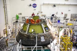 A close-up view shows NASA’s Artemis I Orion capsule secured on a platform inside the Multi-Payload Processsing Facility (MPPF) at Kennedy Space Center in Florida on Jan. 6, 2023.
