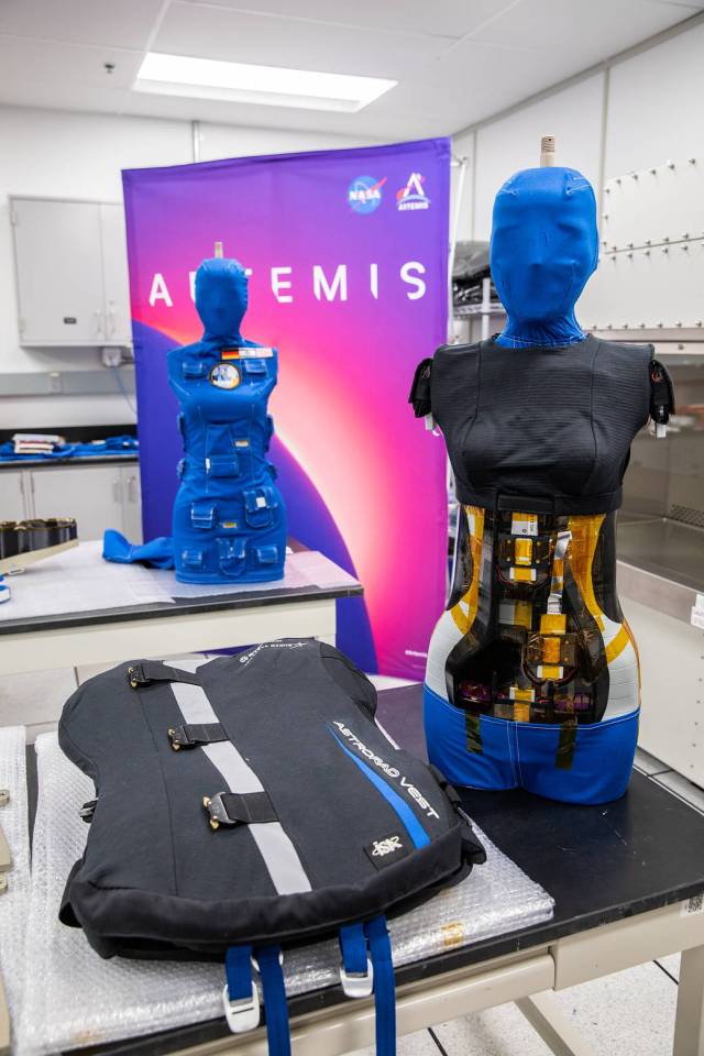 After a 25-day flight beyond the Moon and back inside the Artemis I Orion crew module, two manikins undergo post-flight payload inspections inside the Space Station Processing Facility at Kennedy Space Center in Florida on Jan. 11, 2023.