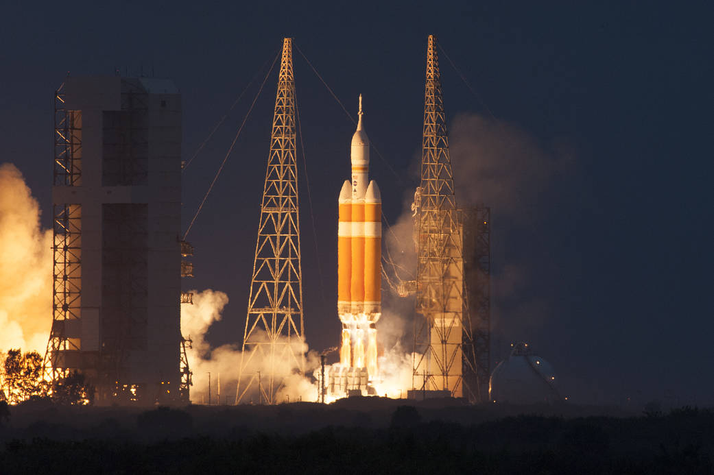 A Delta IV Heavy rocket lifts off from Space Launch Complex 37 at Cape Canaveral Air Force Station in Florida carrying NASA's Orion spacecraft on an unpiloted flight test to Earth orbit. Liftoff was at 7:05 a.m. EST. 