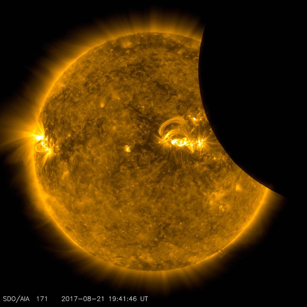 image of moon crossing in front of the sun, from SDO