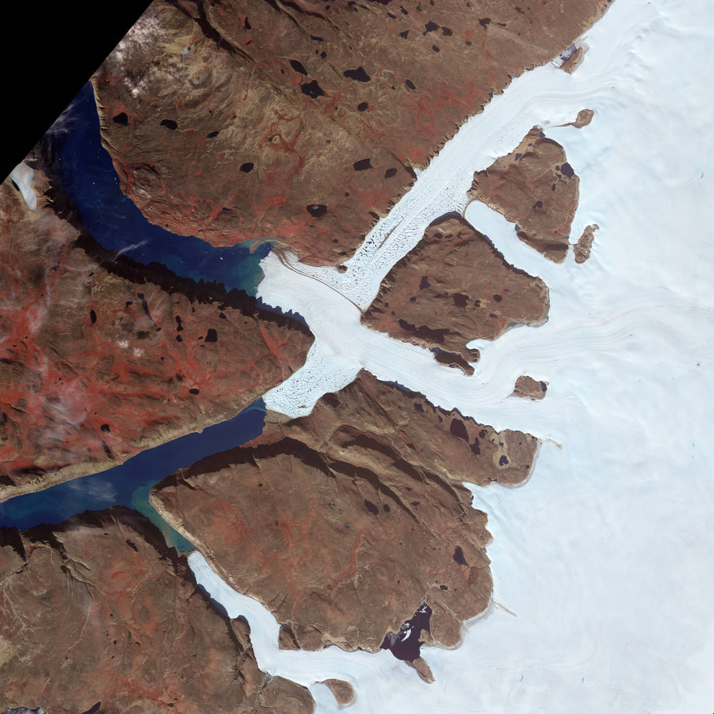 Located in the northwest corner of Greenland, Leidy Glacier is fed by ice from the Academy Glacier (upstream and inland).