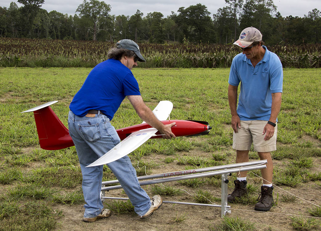 Technician Dave Hare, left, and engineer Lou Glaab prepare to launch a remotely piloted aircraft.