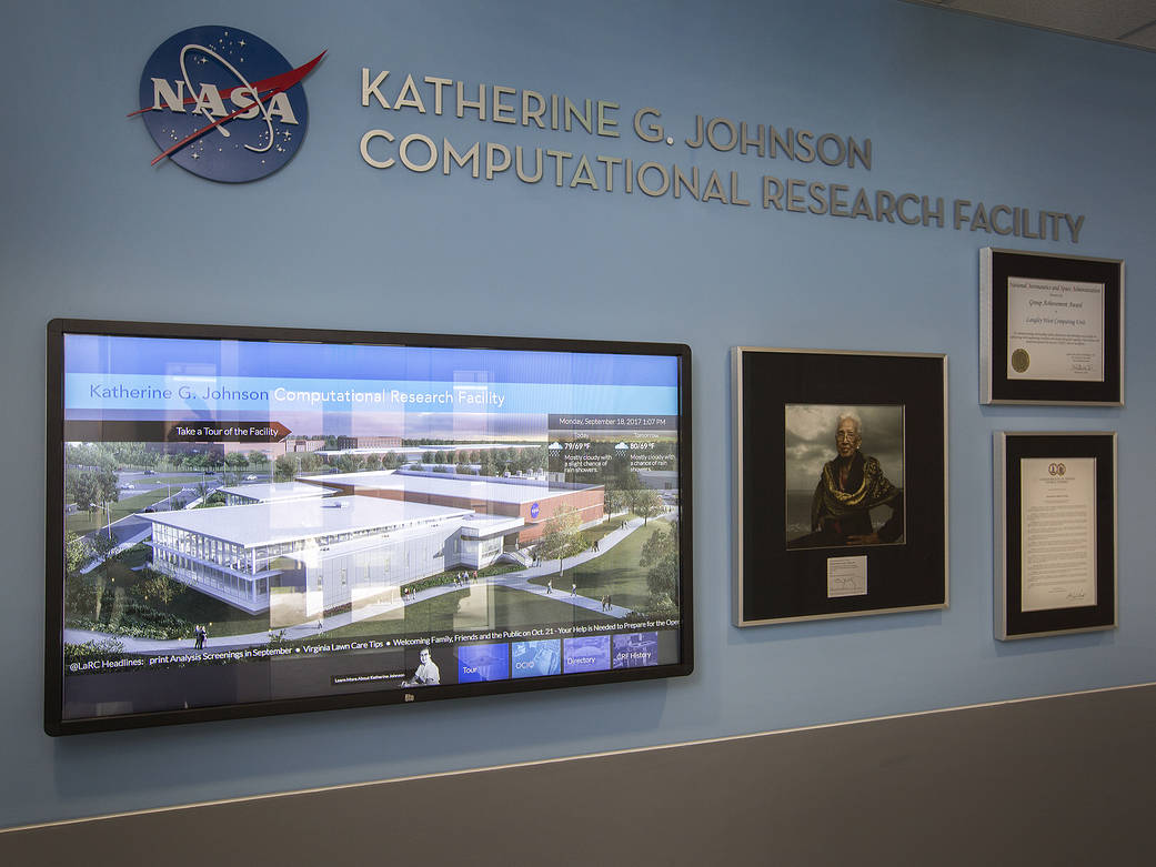 Interior of facility named for Katherine Johnson with portraits