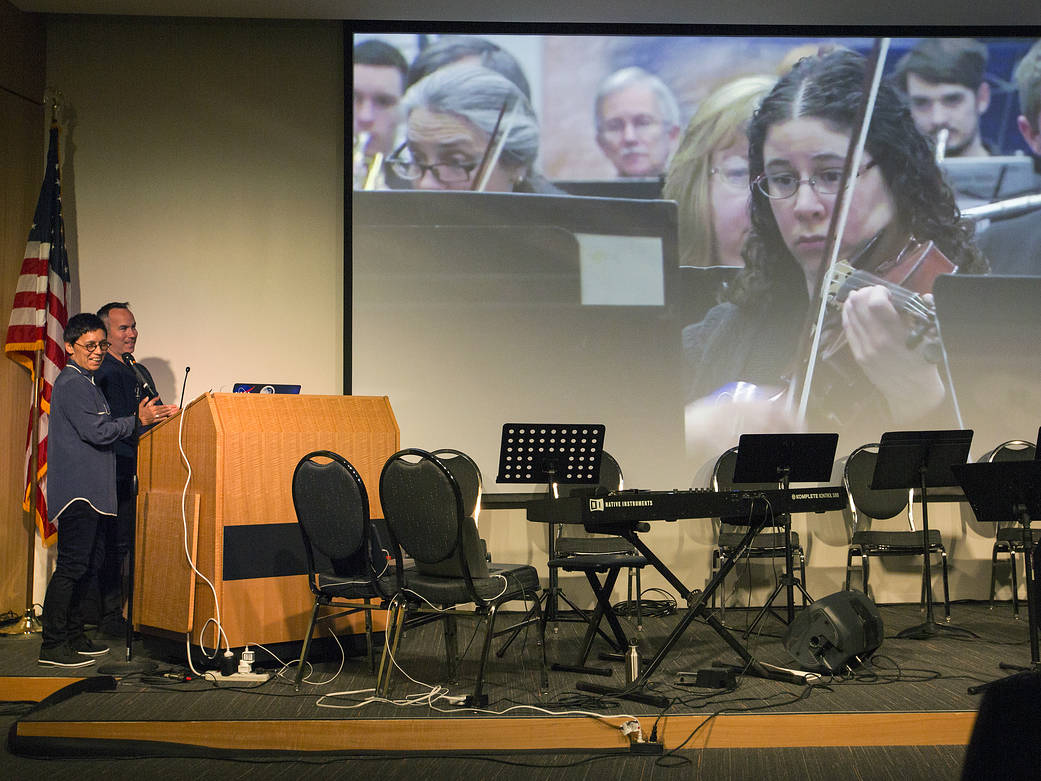 Global Orchestra founders Charlie Chan and Justin Baird speaking at NASA Langley's Pearl Young Theater.
