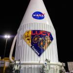 The Lucy spacecraft, encapsulated in its payload fairing, exits the Astrotech Space Operations Facility in Titusville, Florida on Oct. 7, 2021. The spacecraft was transported to nearby Space Launch Complex 41 at Cape Canaveral Space Force Station. 