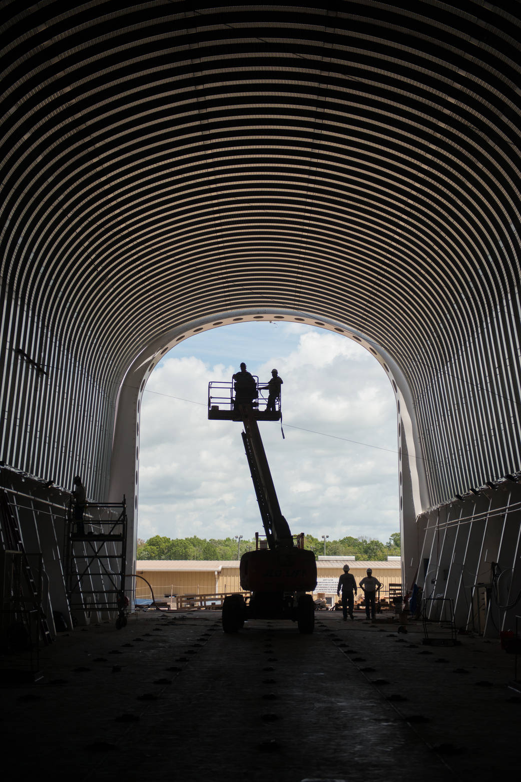 Crews at Conrad Shipyard in Morgan City, Louisiana, complete a 250-foot-long metal canopy for NASA's Pegasus barge.