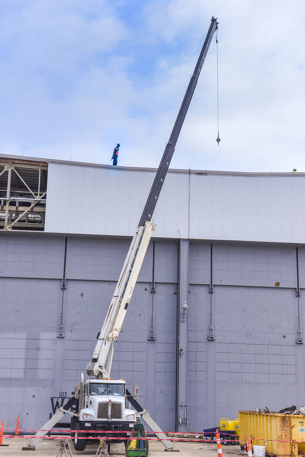 Workers began assessing and making roof repairs to the 43-acre rocket manufacturing building at NASA’s Michoud Assembly Facility