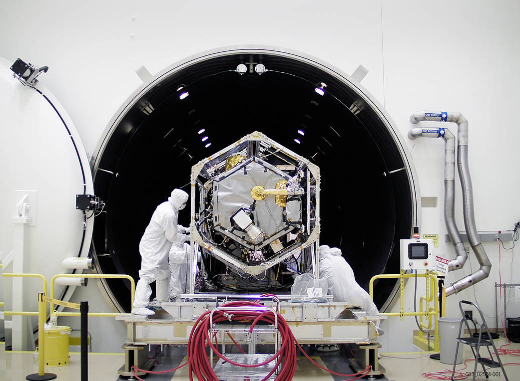 NASA's Orbiting Carbon Observatory (OCO)-2 spacecraft is moved into a thermal vacuum chamber at Orbital Sciences Corporation's S