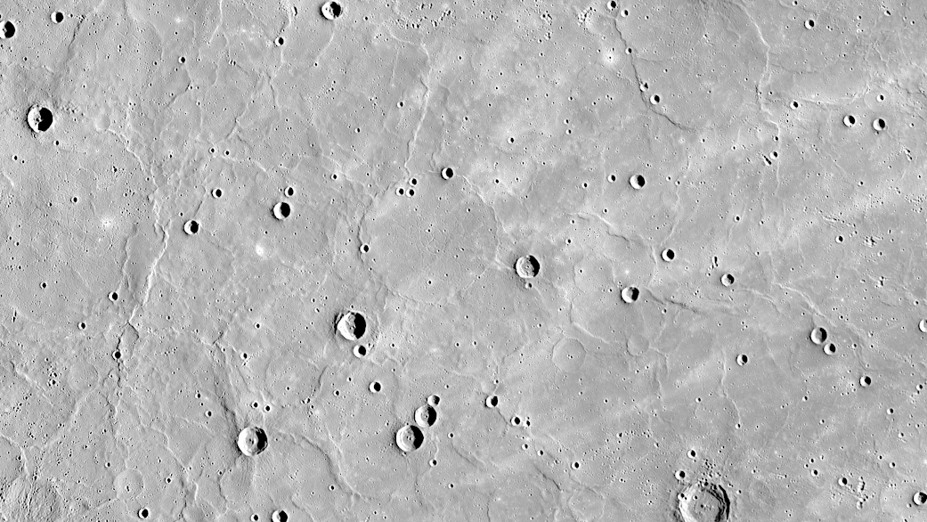 Mercury's northern region is dominated by expansive smooth plains, created by huge amounts of volcanic material flooding across 