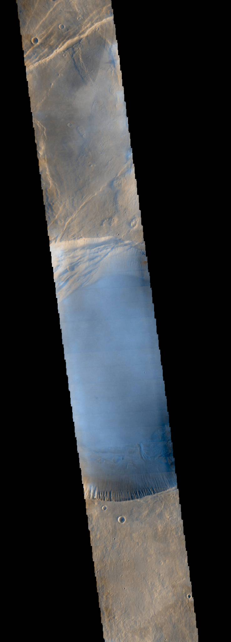 Seen shortly after local Martian sunrise, clouds gather in the summit pit, or caldera