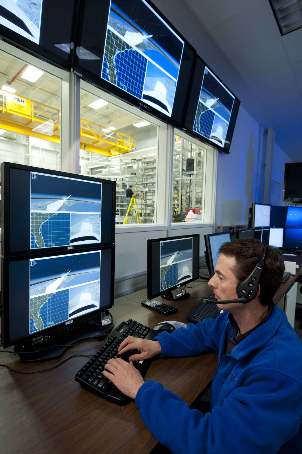 Test engineer James Peckham  runs an avionics flight simulation to see how SLS will perform during launch.