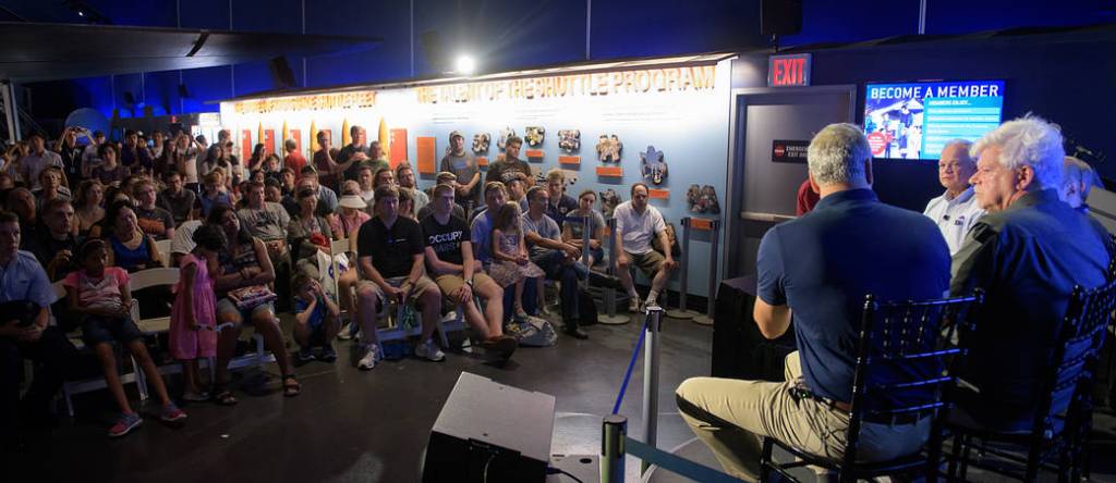 Audience Members Listen to Panel at the Intrepid Air & Space Science Festival