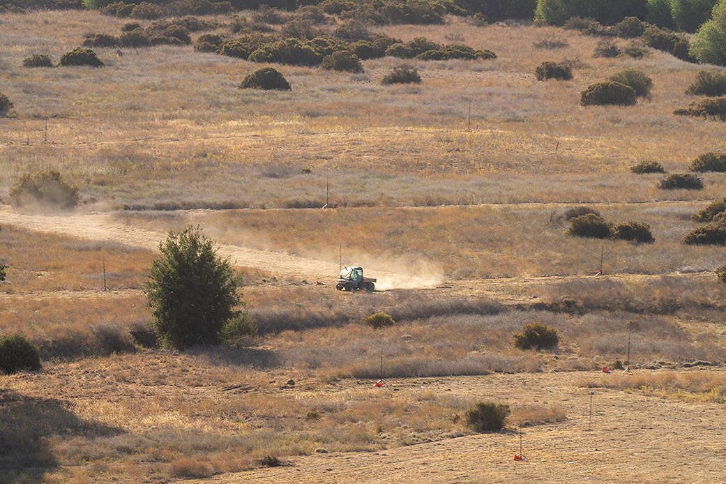 An array of microphones is shown in the desert. 