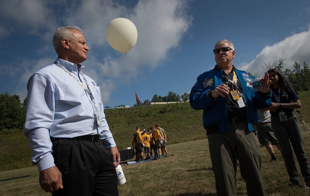 Douglas Terrier and Greg "Box" Johnson Watch Boy Scouts Launch a Weather Balloon at the Boy Scouts of America National Jamboree