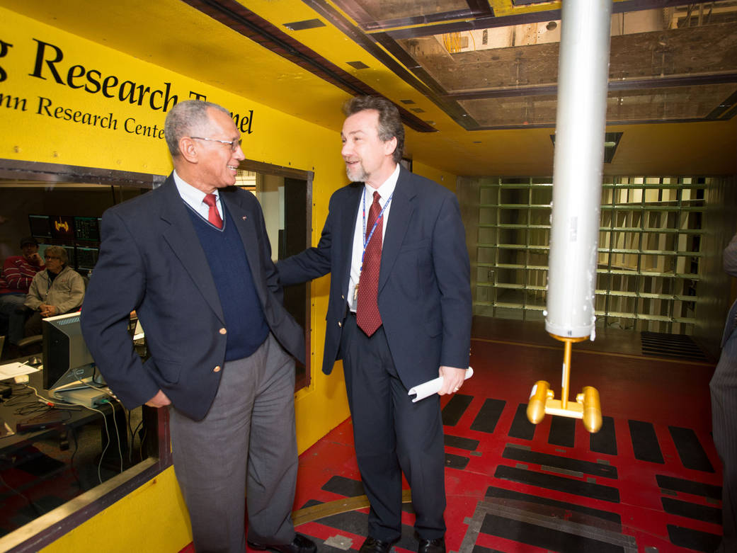 Charlie Bolden and Ron Colantonio standing inside the Icing Research tunnel.