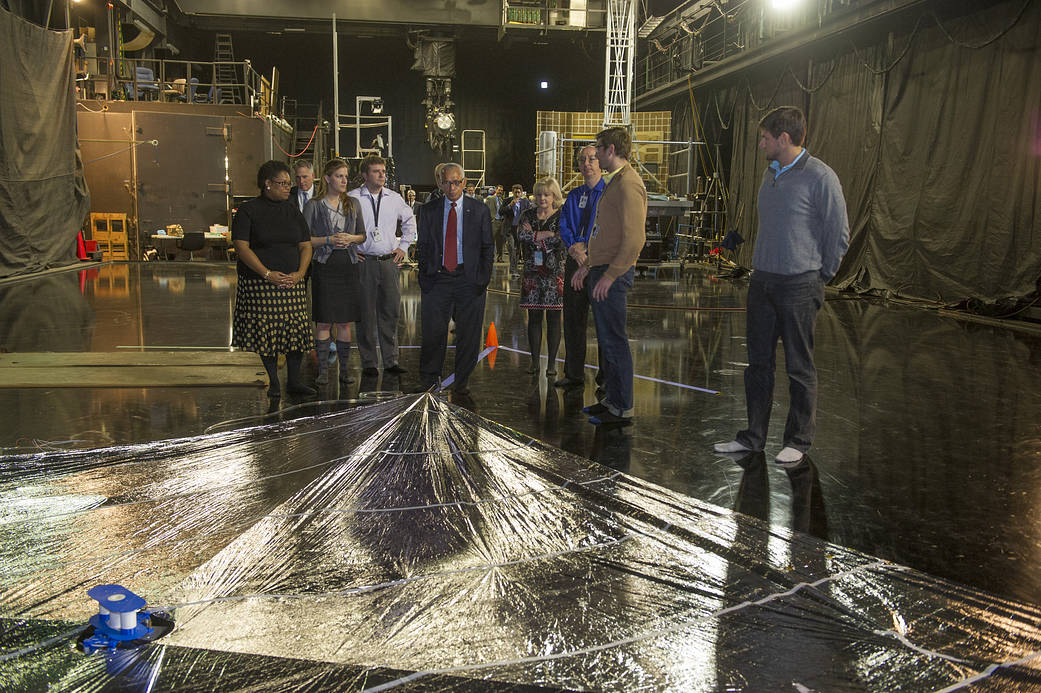 Picture of Administrator Bolden viewing the NEA Scout half-scale solar sail