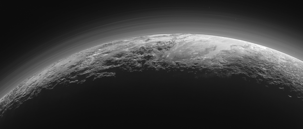 Pluto's mountains, frozen plains and foggy hazes