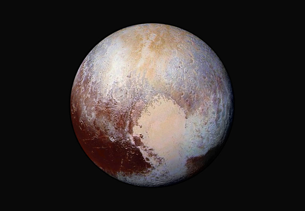 Four images from New Horizons’ Long Range Reconnaissance Imager (LORRI) were combined with color data from the Ralph instrument to create this enhanced color global view of Pluto.