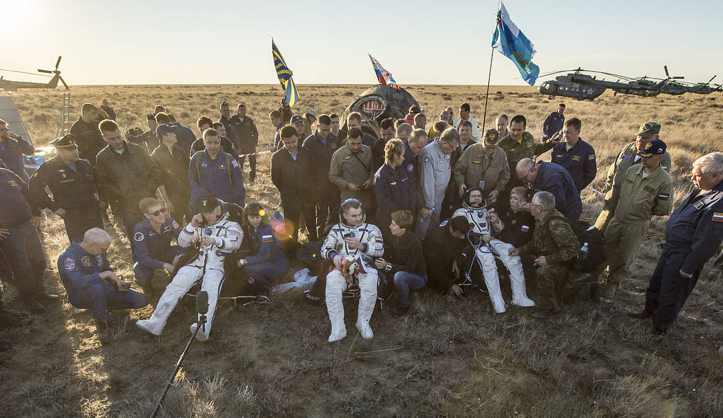 Soyuz capsule carrying Expedition 48 crew lands safely on Earth.