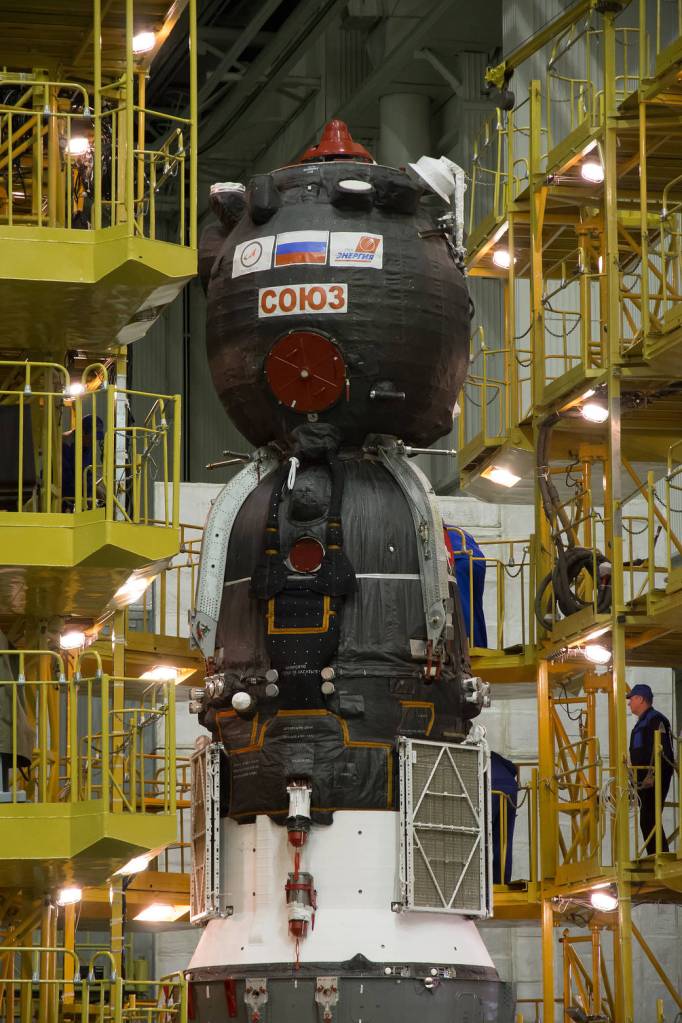 The Work Platform Retracts from Around the Soyuz MS-02 Spacecraft