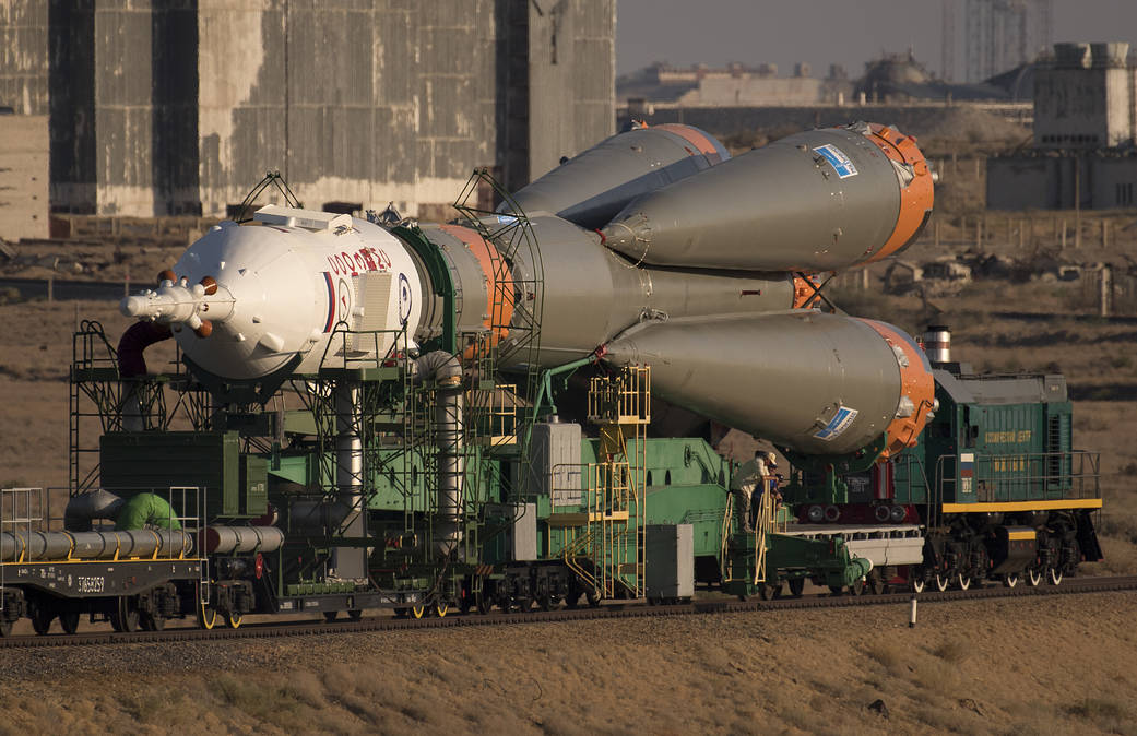 The Soyuz Rocket is Rolled Out by Train to the Launch Pad