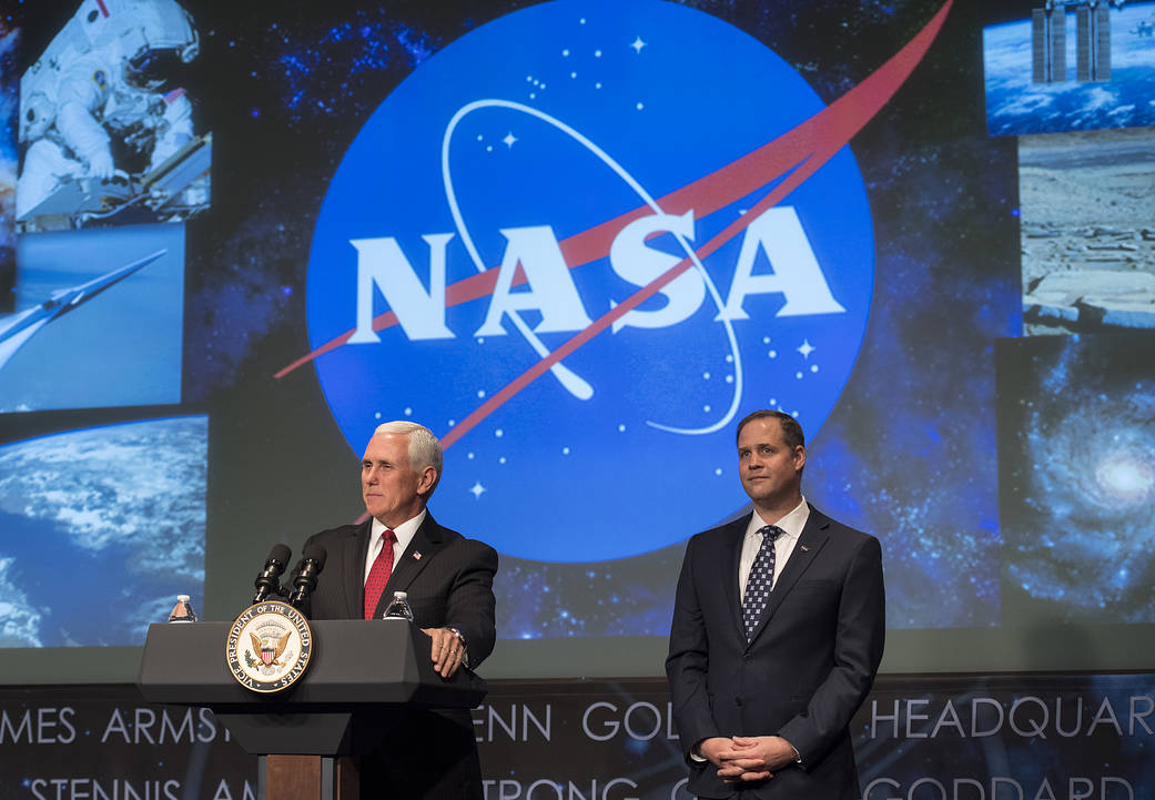 Vice President Pence speaks at podium next to Jim Bridenstine