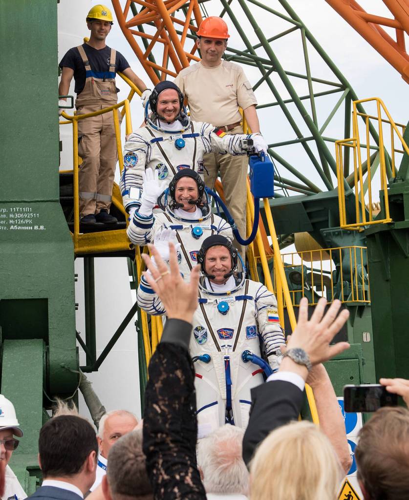 Expedition 56 crew members wave farewell