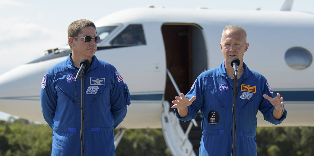  NASA astronauts Robert Behnken, left, and Douglas Hurley speak to members of the media after arriving at KSC ion May 20, 2020.