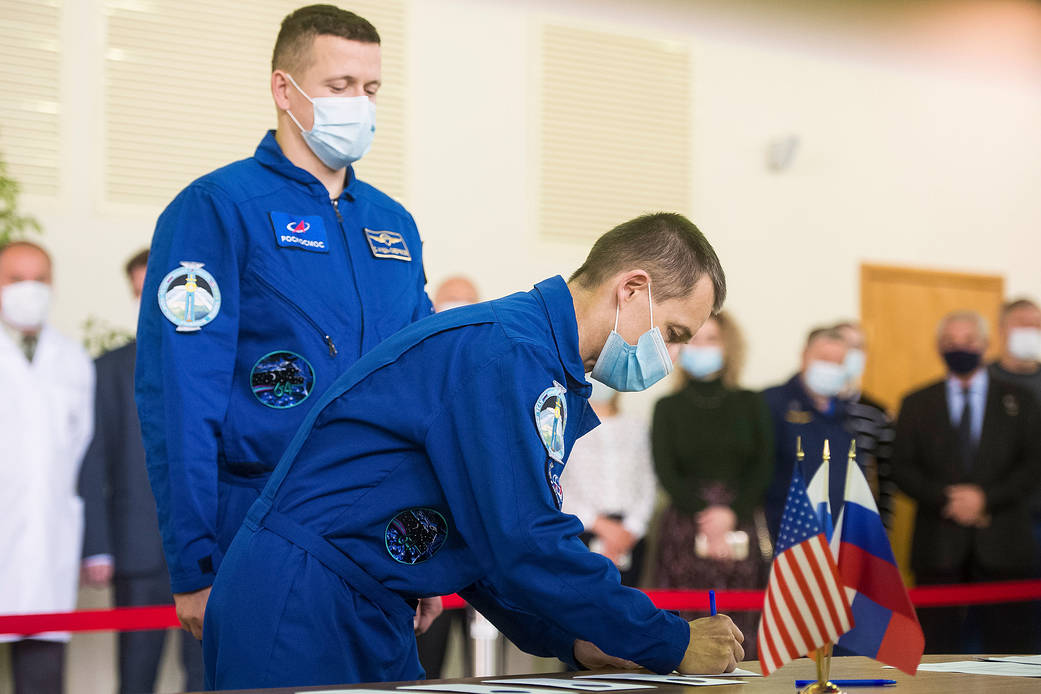 Sergey Ryzhikov of Roscosmos signs in for Soyuz qualification exams