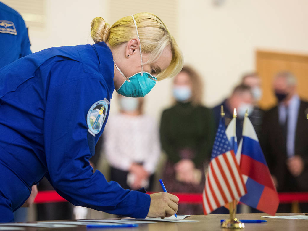 NASA astronaut Kate Rubins signs in for Soyuz qualification exams