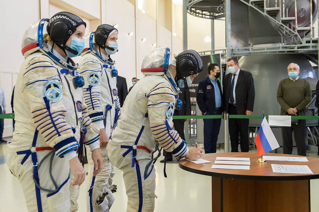 Sergey Ryzhikov of Roscosmos signs in for his Soyuz qualification exams