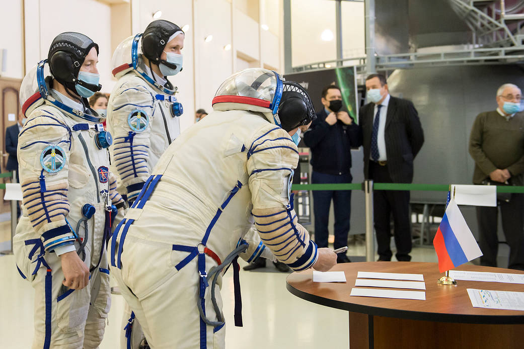 Kate Rubins of NASA signs in for Soyuz qualification exams