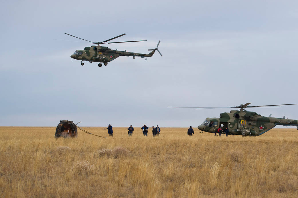 Support personnel arrive at the Soyuz MS-16 spacecraft landing site