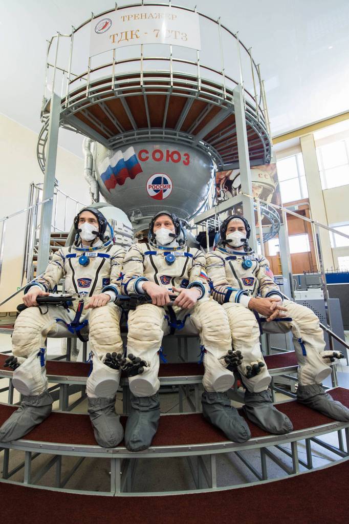 Expedition 65 crew members during qualification exams