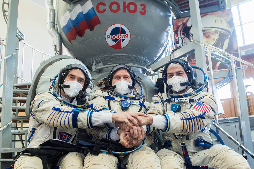 Expedition 65 crew members during qualification exams