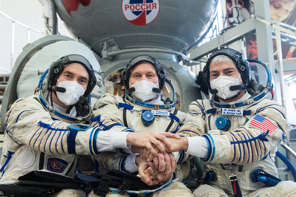Expedition 65 crew members during qualification exams