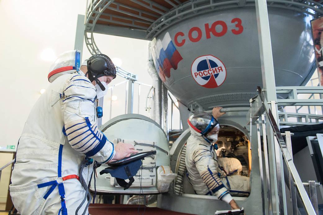 Expedition 65 crew members during Soyuz qualification exams