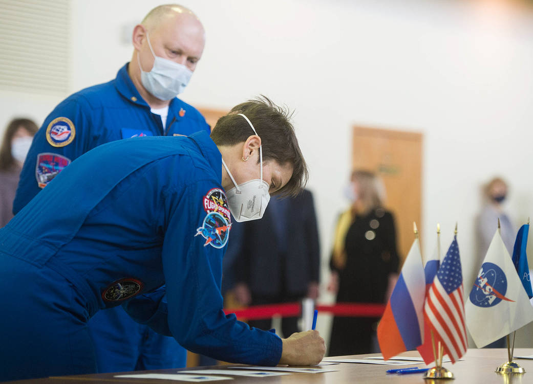 NASA astronaut Anne McClain signs in for Soyuz qualification exams