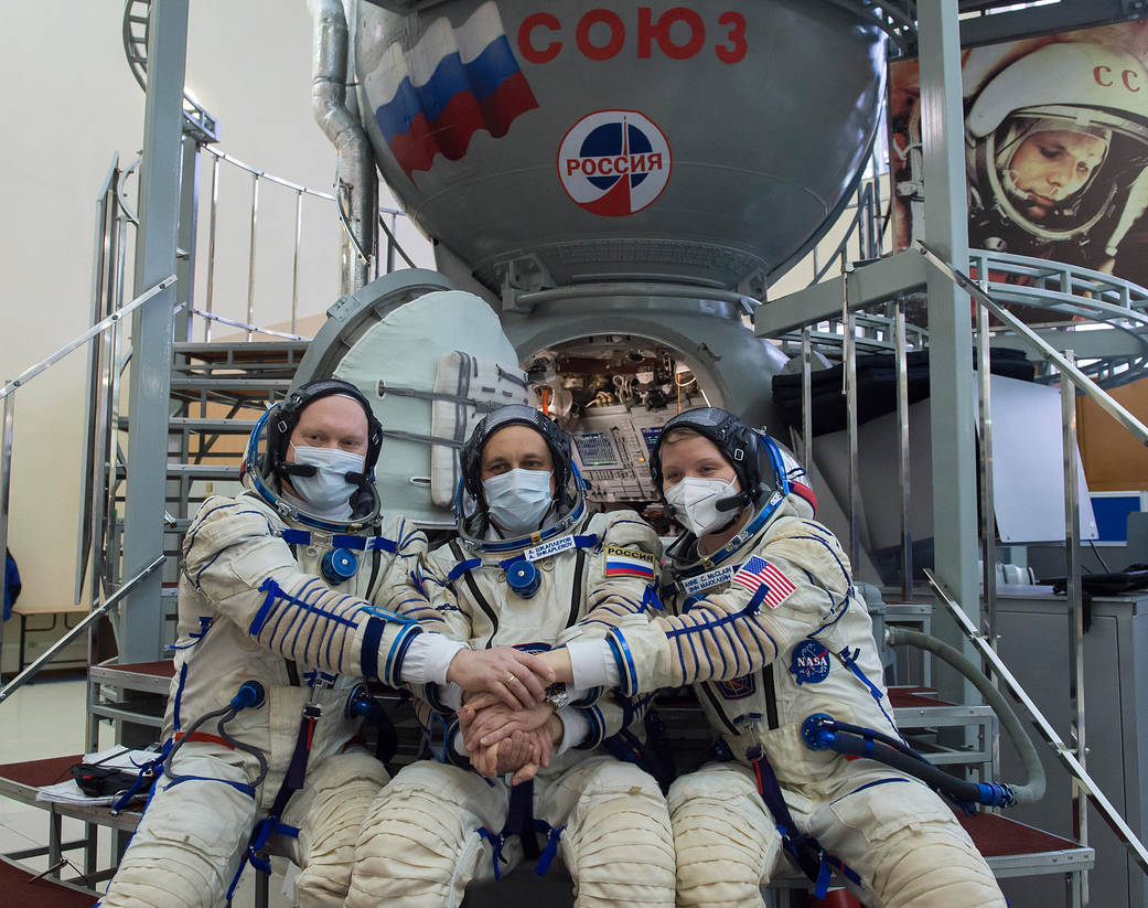 Expedition 65 backup crew members pose for a photo