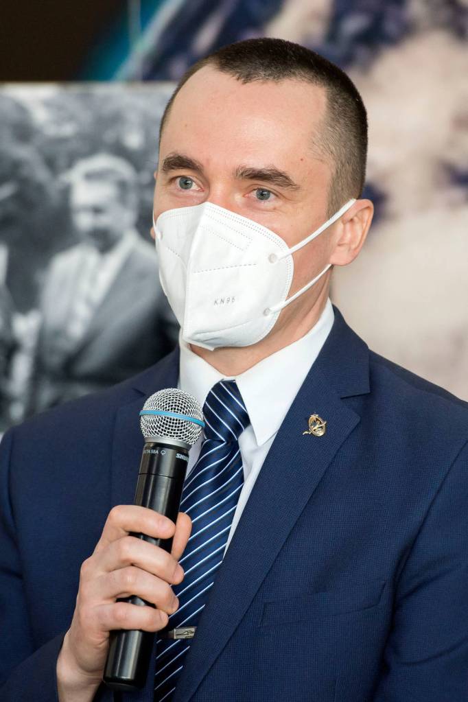 Cosmonaut Pyotr Dubrov of Roscosmos speaks during