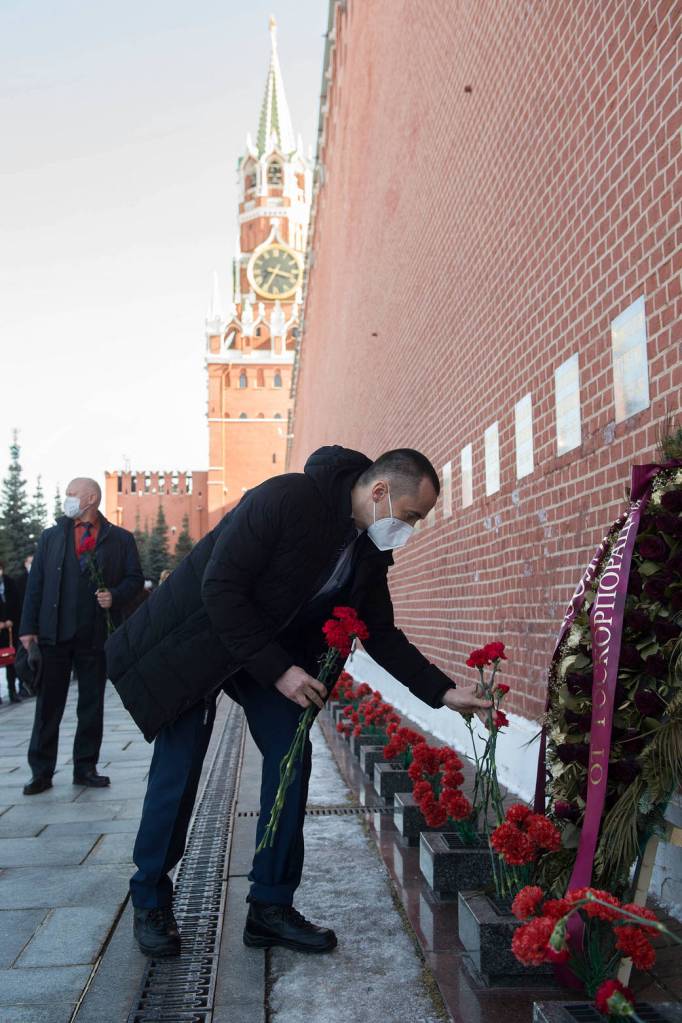 Cosmonaut Pyotr Dubrov lays flowers at Red Square