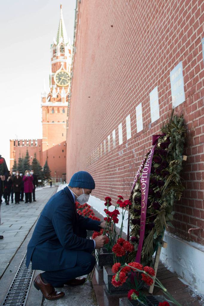 NASA astronaut Mark Vande Hei lays flowers at Red Square