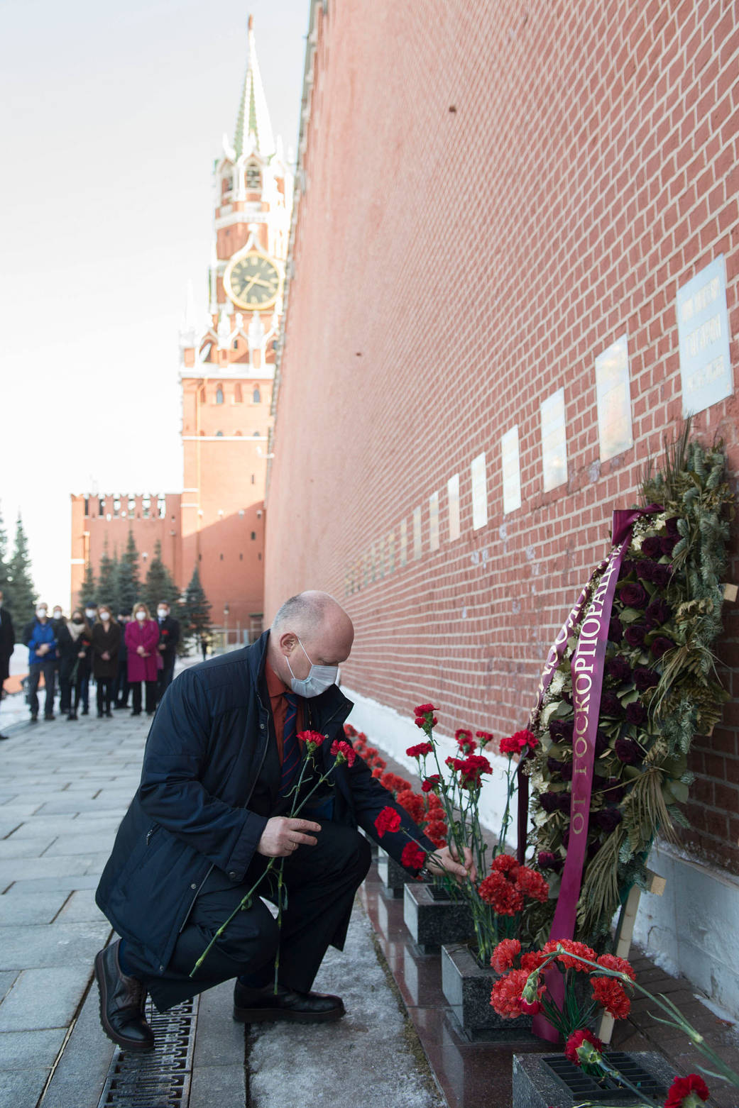 Cosmonaut Oleg Artemyev of Roscosmos lays flowers at Red Square