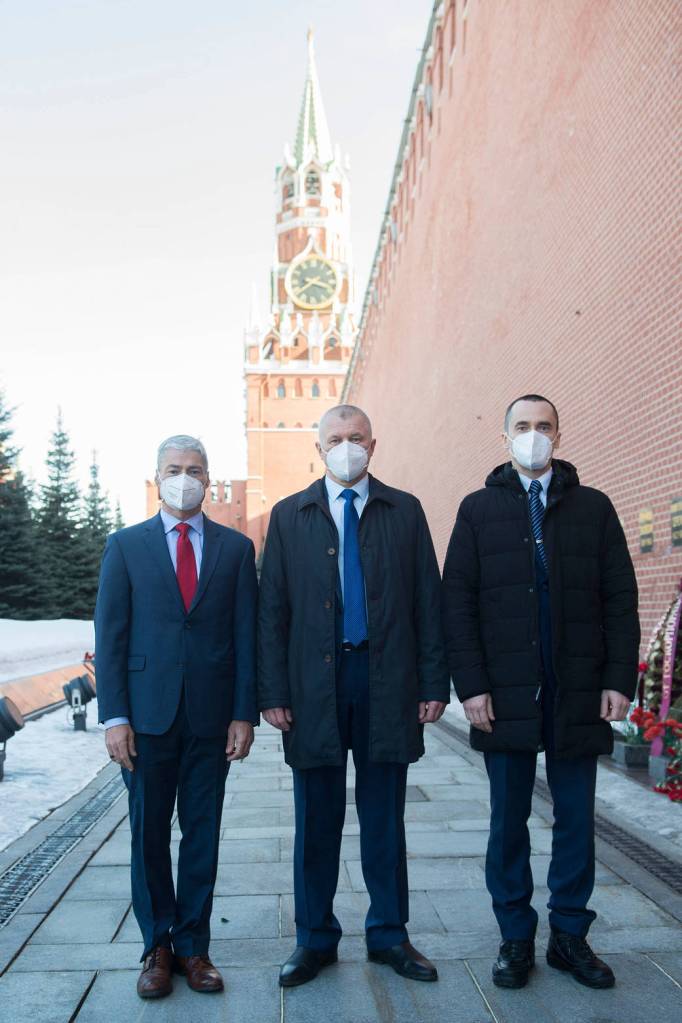 Expedition 65 prime crew members pose for a photo in Red Square