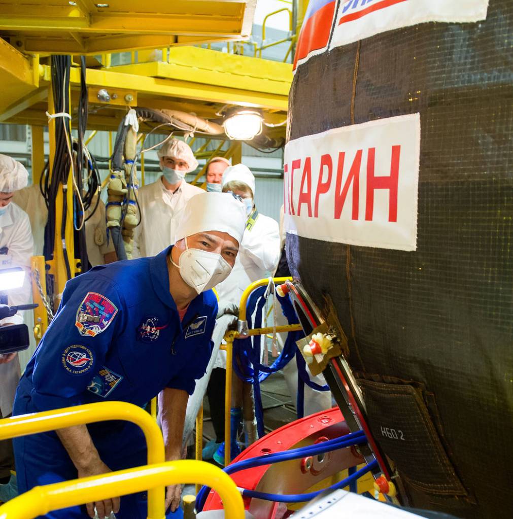 NASA astronaut Mark Vande Hei is seen heading inside the Soyuz