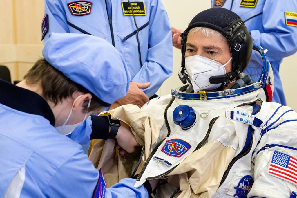 NASA astronaut Mark Vande Hei dons his Sokol Suit during a fit check